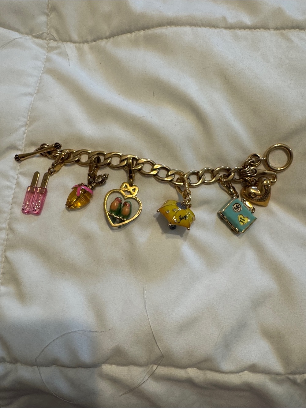 Juicy Couture Gold Charm Bracelet with Pink, Yellow, Green and Turquoise Charms